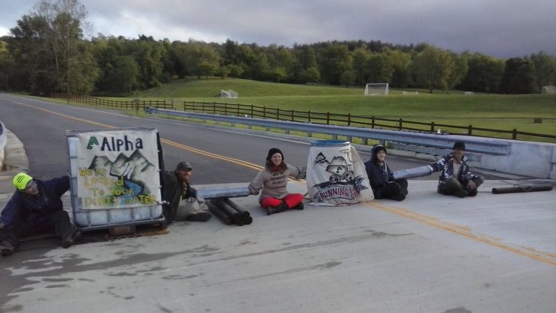 Residents shut down Alpha headquarters with support from Mountain Justice
