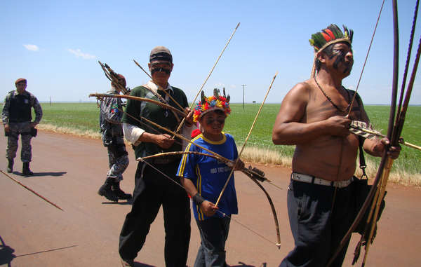 Olympics: Torch reaches land of tribe facing genocide