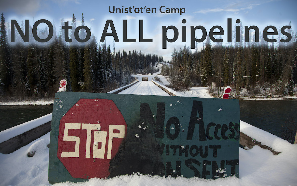 Image of Unist'ot'en bridge - sign reads no to all pipelines